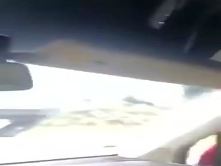 Sexually aroused shemale clip her hard shaft while driving
